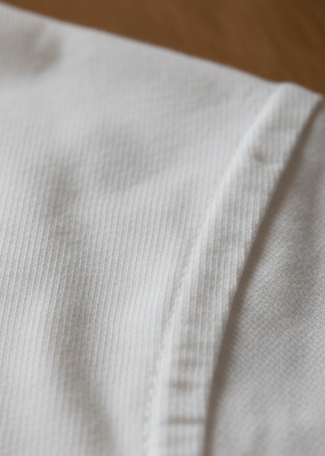 Close-up of white t-shirt fabric
